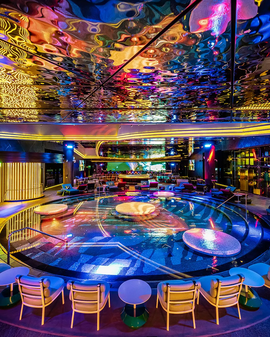 Seating around the indoor pool at Chroma
