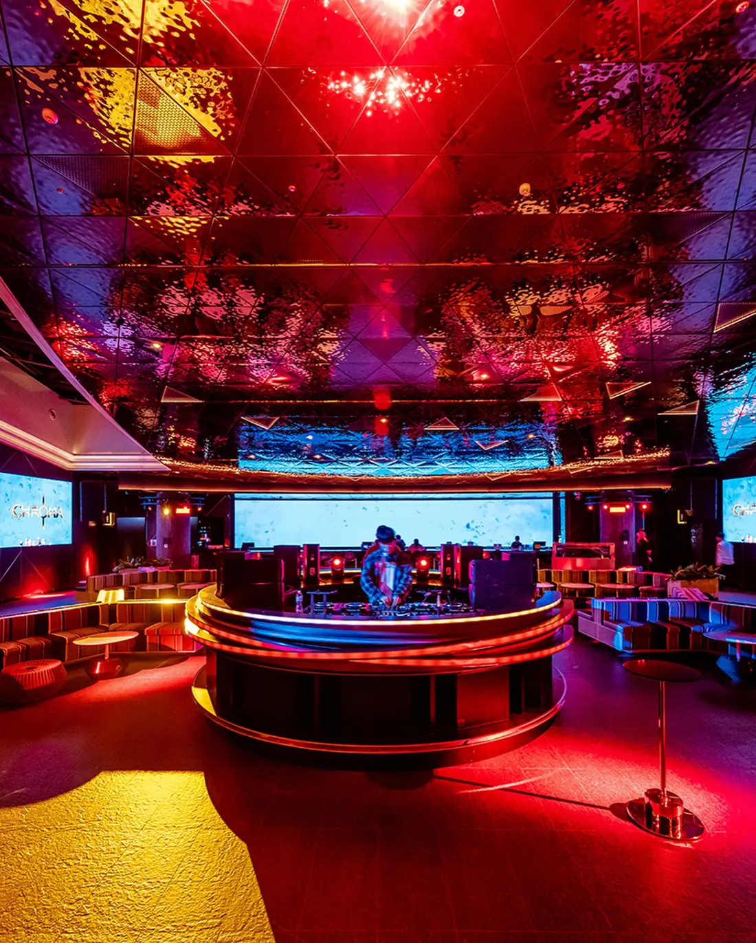 The circular bar at Grande Chroma Theatre under red light